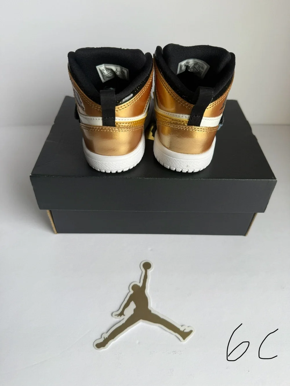Jordan Baby High-Top Sneakers in Black and Gold